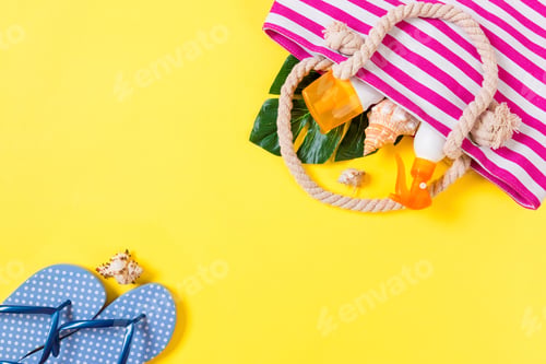 Preview: Summer bag background with copy space. Flat lay photo on color table, travel concept.