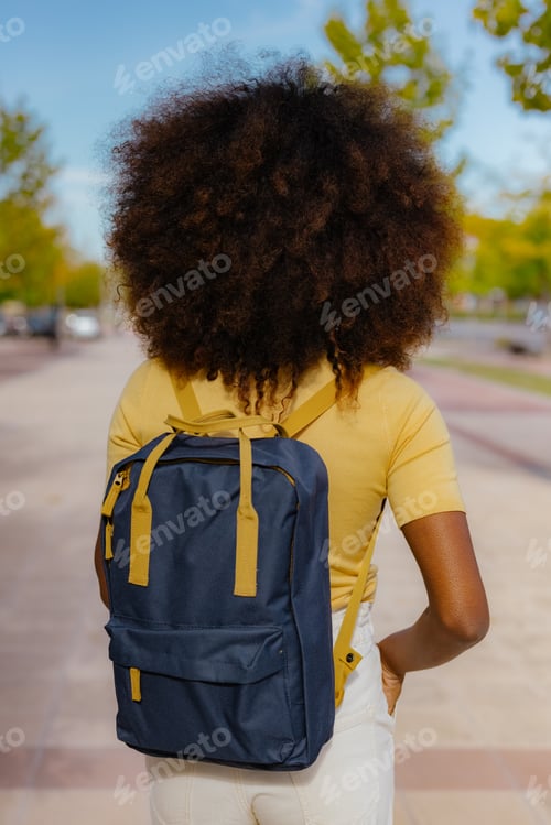 Preview: Back view black woman with afro hair