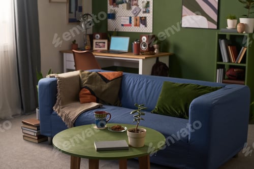 Preview: Living Room Interior Featuring Cozy Sofa and Home Office Workspace