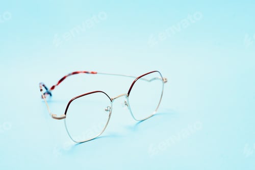 Preview: Poster of glasses on pastel background. Optics. Vision.