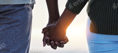 Preview: Holding hands, couple and love outdoor at the beach with care, trust and commitment. Closeup of a m