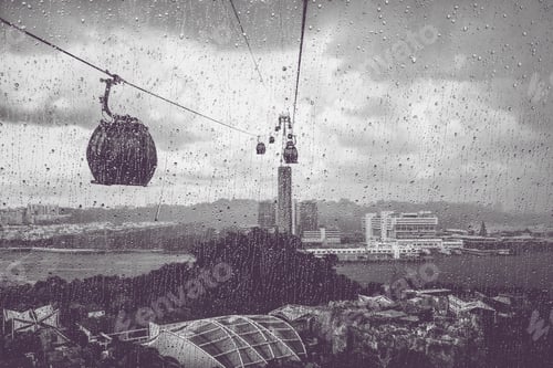 Preview: Black and white photo of Singapore's cable car in the heavy rain
