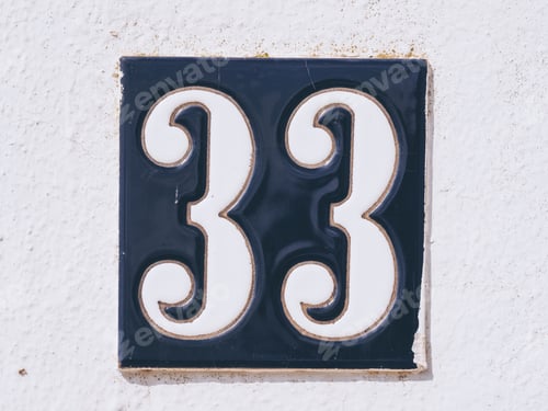 Preview: Closeup shot of a number 33 house sign