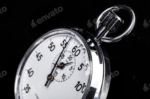 Preview: Shiny Stopwatch Against Black Background Displaying Precision Time