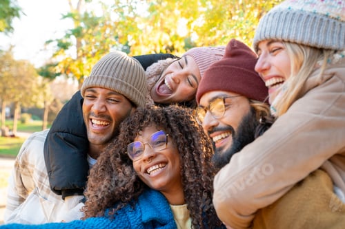 Preview: Cheerful group of friends taking smiling selfie. Happy people having fun together outdoors.