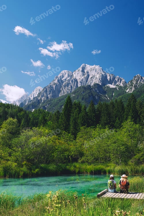 Preview: Couple tourists enjoying green nature outdoors. Amazi