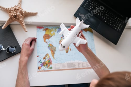 Preview: guy, at home, dreams, plane, tickets online, beach vacation, sea, map, ship, travel