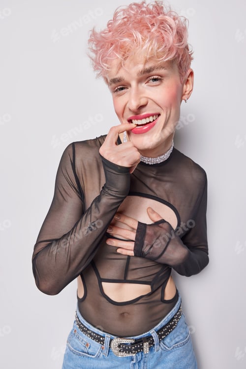Preview: People positive emotions concept. Indoor vertical photo of young fit happy smiling lgbt European boy