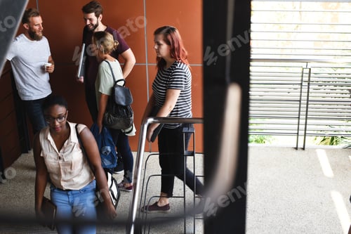 Preview: People Talking at Stairway During Break Time