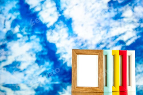 Preview: front view different picture frames with colored corners on light-blue background color picture
