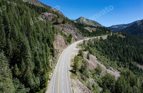 Preview: Scenic Highway in the valley going over the Mountain Pass. Sunny Summer Day.