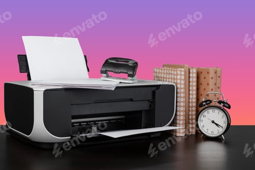 Preview: Compact home laser printer against pink background