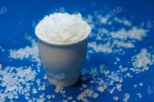 Preview: salt in a jar on a blue background,