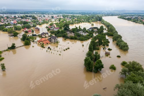 Preview: Aerial view of flooded houses with dirty water of Dnister river in Halych town, western Ukraine.
