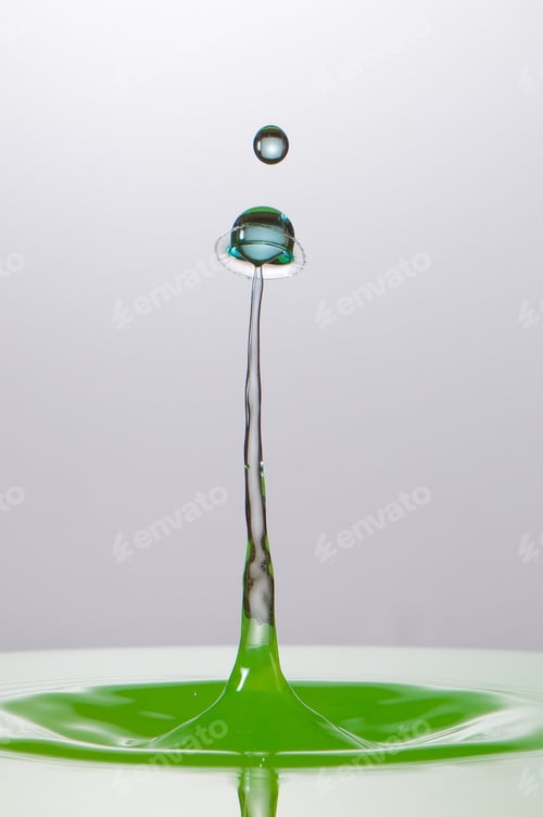 Preview: Splash of colorful liquid with high speed flash