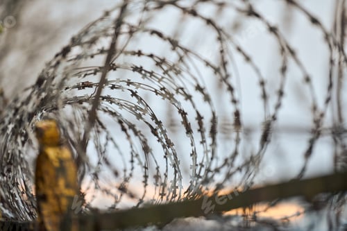 Preview: Barbed wire on fence of restricted area