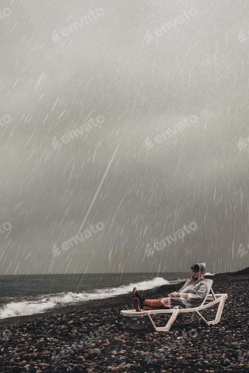 Preview: girl alone seashore rain. Depression.mental health,stress.Mental Health Awareness Week.Burnout synd