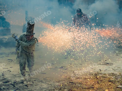 Preview: Ibi, Spain - December, 28 2018: People celebrating victory in flour and eggs battle