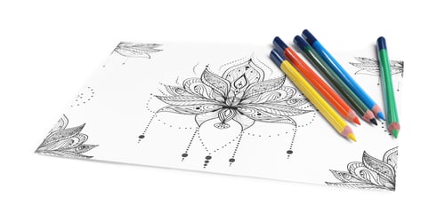 Preview: Antistress coloring page and pencils on white background