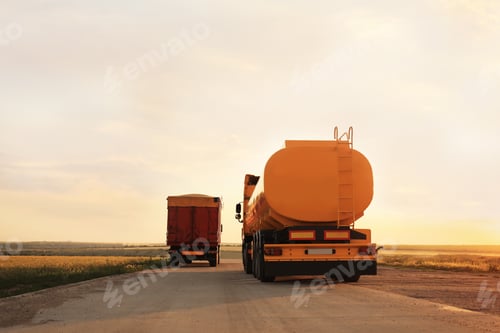Preview: Modern bright trucks parked on country road