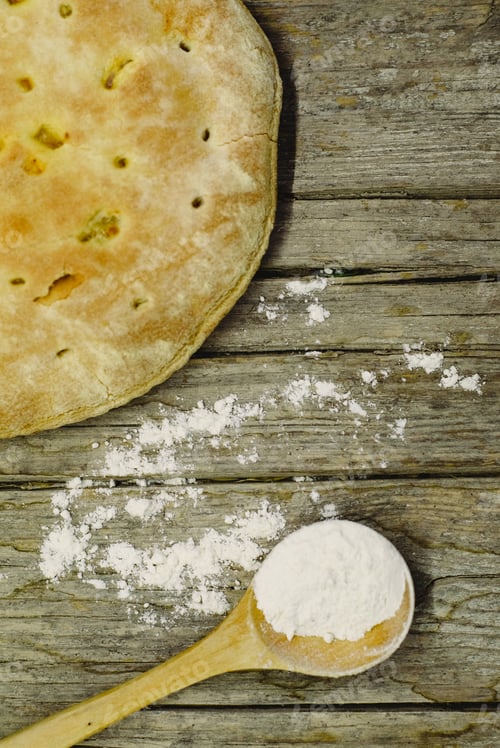 Preview: Pizza Calzone on old wooden table