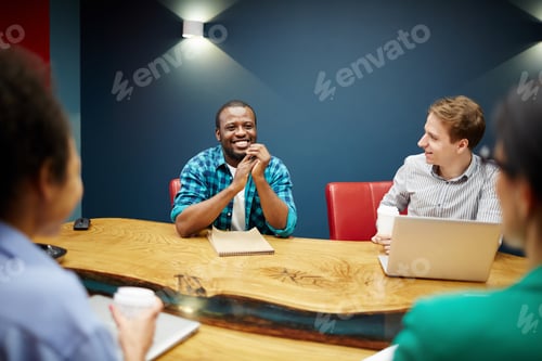 Preview: Teamwork at business meeting