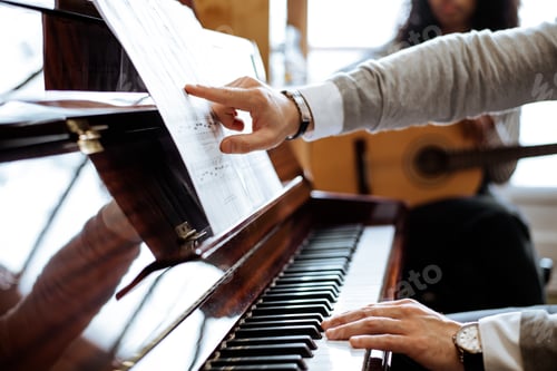 Preview: Crop male hands playing piano