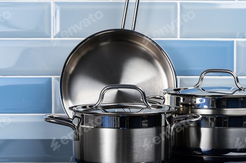 Preview: Set of aluminum cookware on kitchen counter