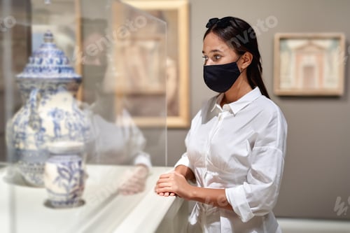Preview: Visitor Looking Art Object In Museum