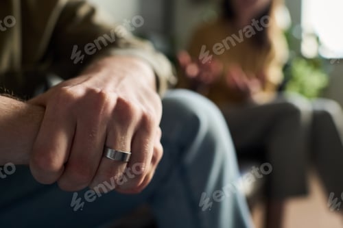 Preview: Caucasian Young Adult Man Wearing Wedding Ring Attending Counseling Session