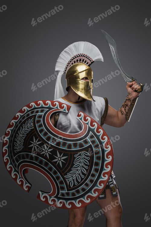 Preview: Authentic swordsman from greece isolated on gray background