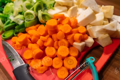 Preview: Closeup shot of raw vegetables sliced on the desk - perfect for a food blog or recipe article