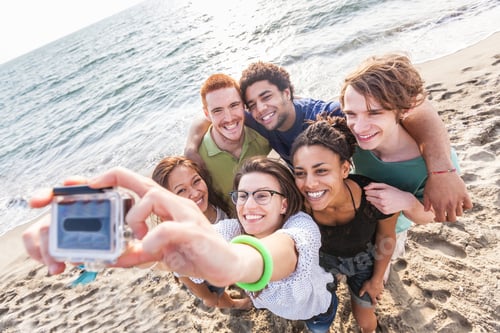 Preview: Multiracial Group of Friends Taking Selfie at Beach