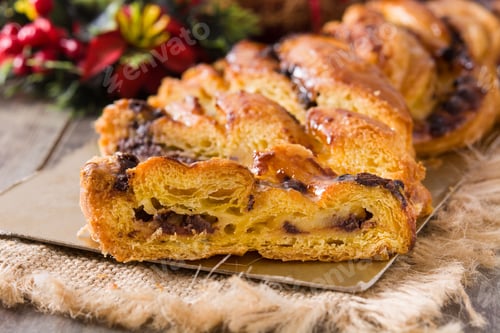 Preview: Braided Sweet Bread with Chocolate Filling on wooden table