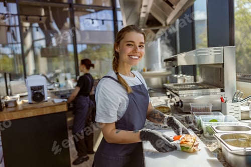 Preview: A Smiling Chef Joyfully Preparing Fresh Ingredients in a Modern, Stylish Kitchen Space