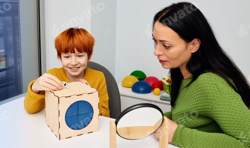 Preview: Speech therapy games. Male child patient training his pronunciation with private child development