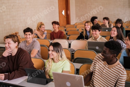 Preview: Heterogeneous group of students paying attention to university classes