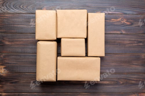 Preview: top view of various gift boxes, blank for you design on wooden desk