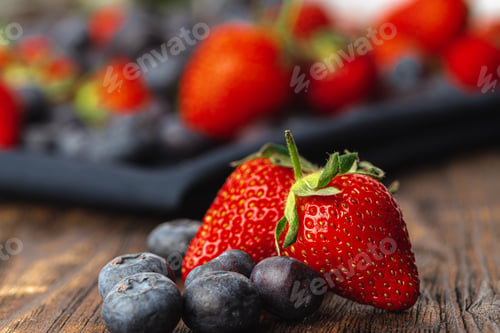 Preview: Close up photo of blueberries and strawberries