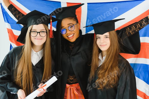 Preview: portrait of multiracial graduates holding diploma