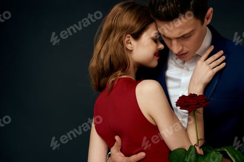 Preview: Beautiful couple charm hug lifestyle relationship rose luxury dark background