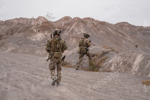 Preview: Squad of Soldiers Running Forward and Atacking Enemy During Military Operation in the Desert.
