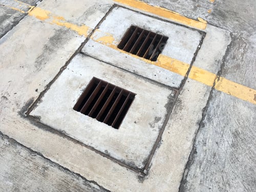 Preview: The iron grate of the drainage system on the footpath