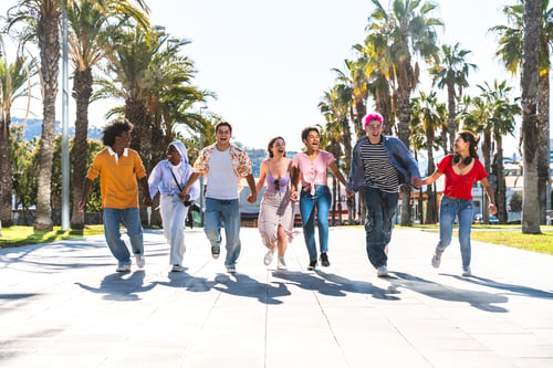 Preview: Multiethnic group of young happy friends hanging out