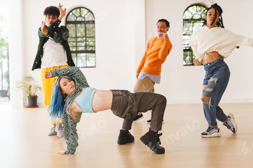 Preview: Image of diverse female and male hip hop dancers during training in dance club