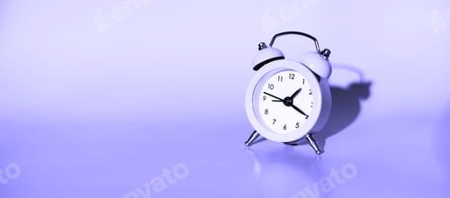 Preview: Small alarm clock on a blue background. Side view, place for text.
