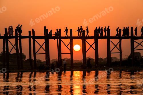 Preview: People walking over Bein Bridge at sunset, Amarapura, Mandalay, Myanmar