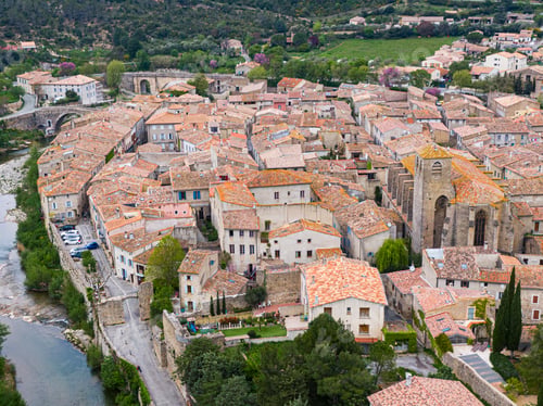 Preview: Aerial view of Lagrasse medieval city, Aude, Occitanie. the city is built along the river Orbieu