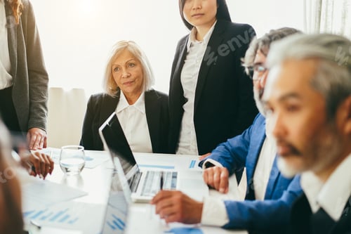 Preview: Multiracial business people working inside bank office - Focus on senior woman face