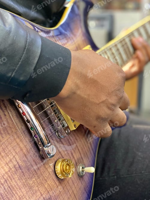 Preview: Diverse gen z black male electric guitarist musician plays guitar